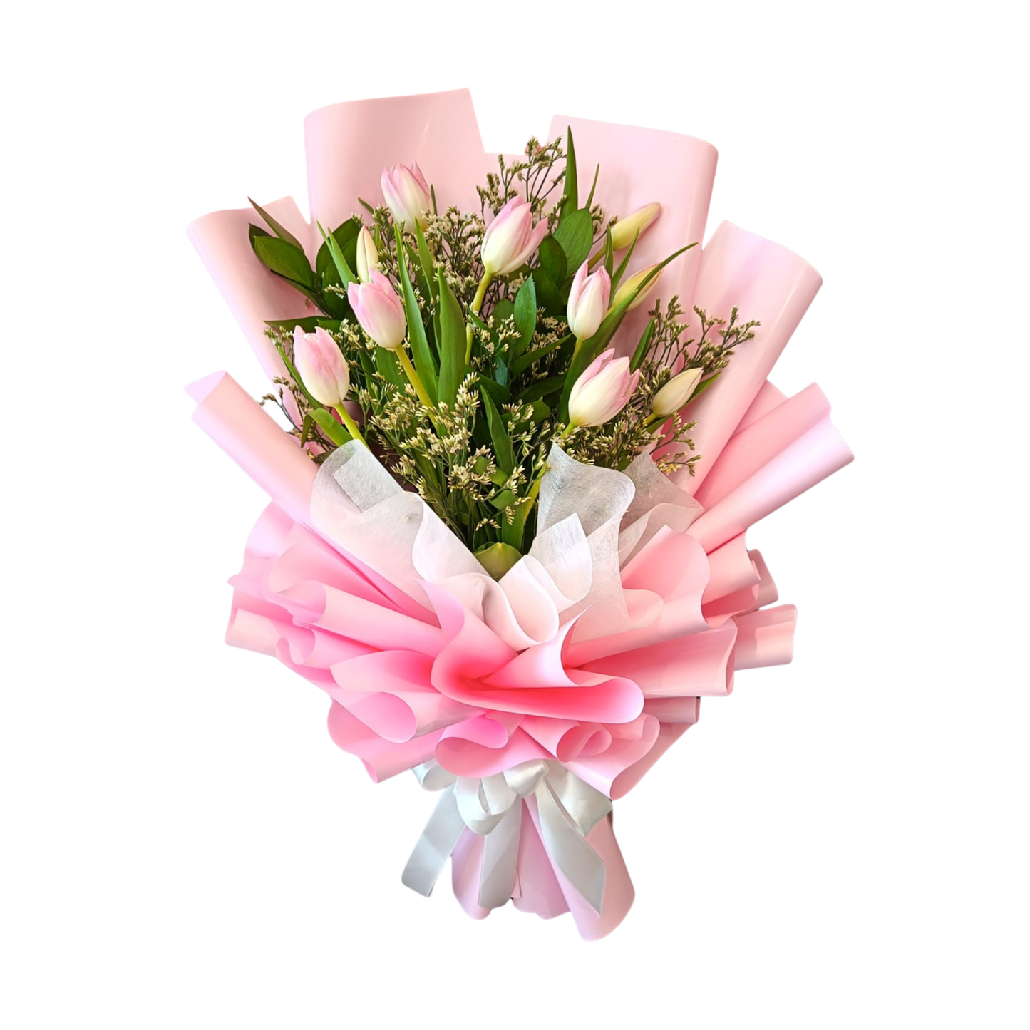 Bouquet of pink single tulips and limoniums, with lush green contrast of ruscus leaves, elegantly wrapped in pink floral paper and white ribbon detail.