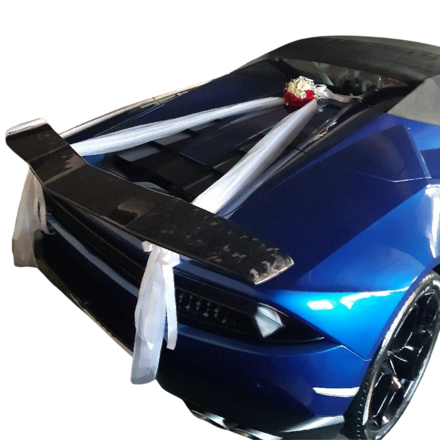 Hayat Flower's LOVE ABLAZE wedding car decoration for the rear of a blue Lamborghini sports car.