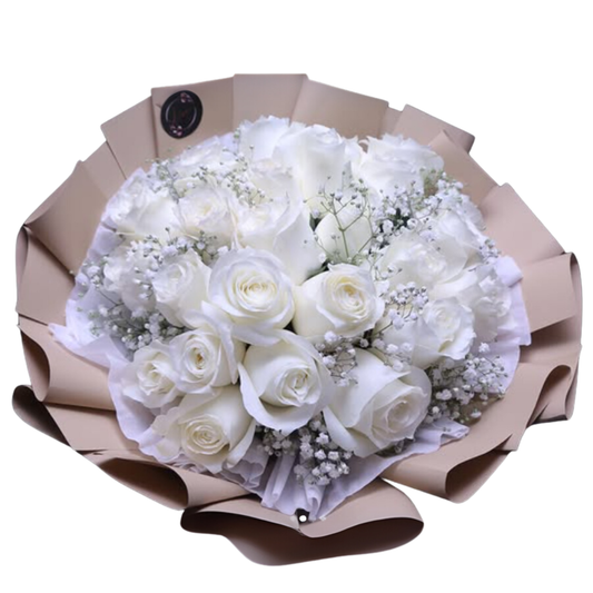 Top view of a hand-tied Pure White Elegance bouquet featuring 25 white roses and airy baby’s breath with simple, kraft paper wrapping.