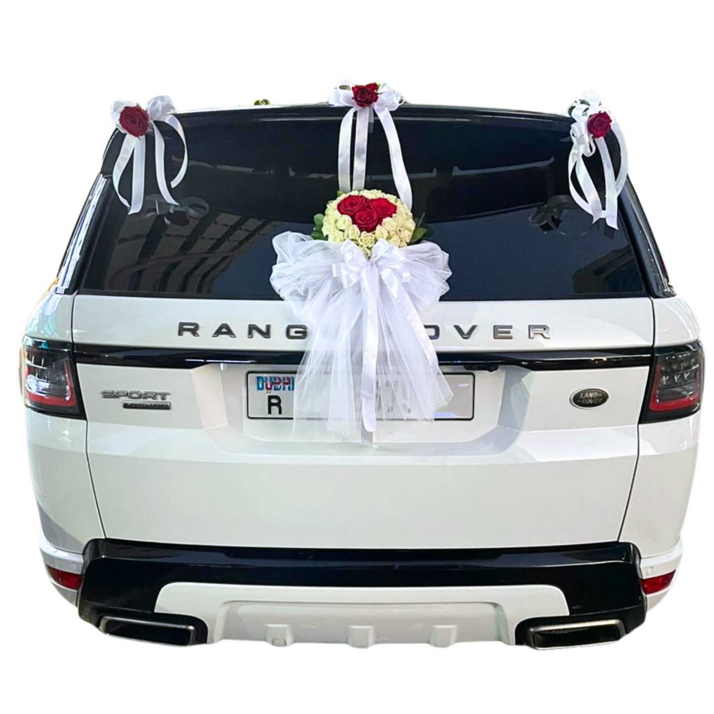Rear view of a Range Rover wedding car decoration by Hayat Flowers and Events.
